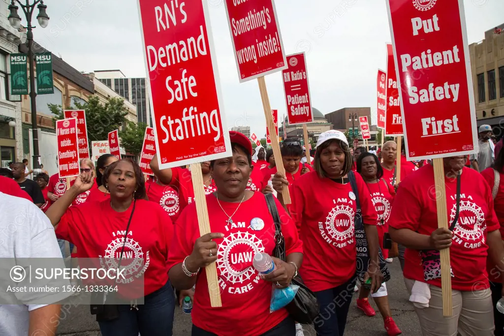 Detroit, Michigan - Health care workers, members of the United Auto Workers union, join a march commemorating the 50th anniversary of Dr. Martin Luthe...