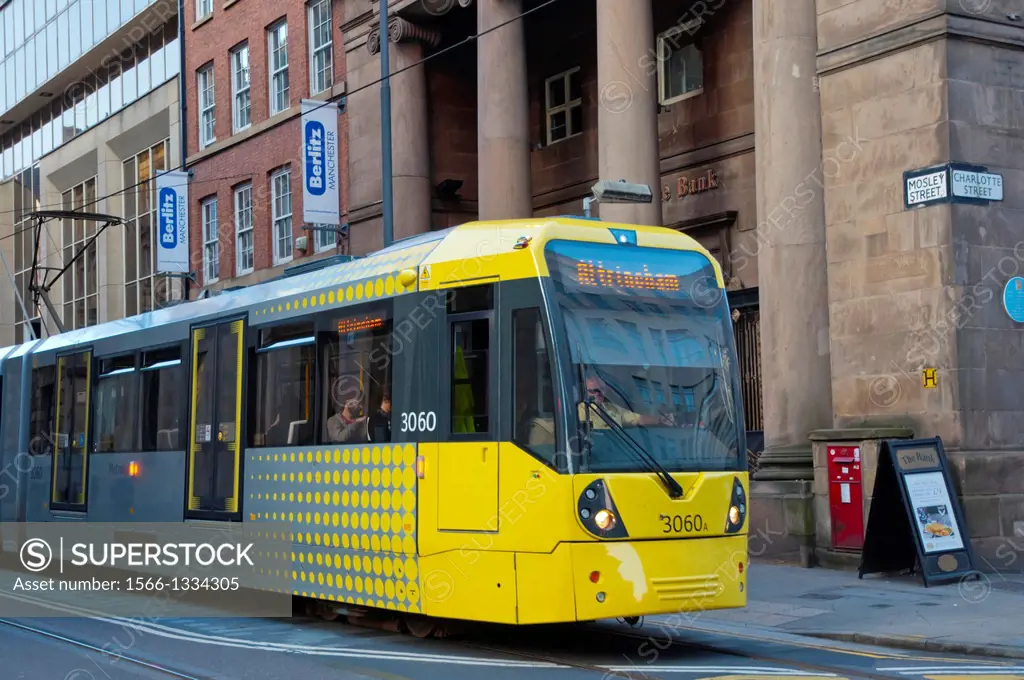 Tram on Mosley street central Manchester England Great Britain UK Europe.