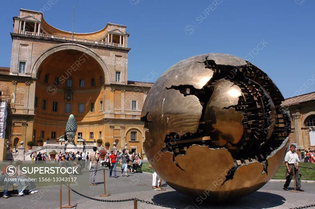 Sphere Within Sphere sculpture by Pomodoro in the Cortile della Pigna, Vatican Museum Gardens, Rome, Lazio, Italy.