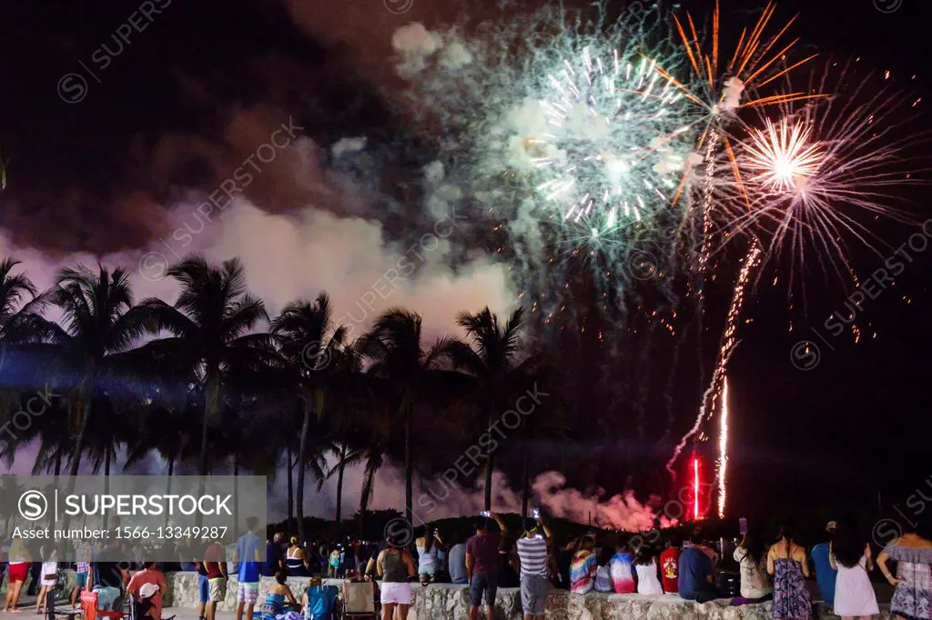 Florida, Miami Beach, South Beach, Lumms Park, Fourth of July, Independence Day, holiday, celebration, fireworks spectators, coconut palm trees, smoke...