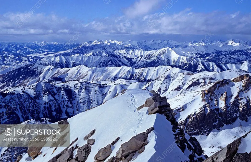 Pioneer Mountains, Winter view from the summit of Cobb Peak of foot prints on the West Ridge and central Idaho mountain ranges in the Pioneer Mountain...