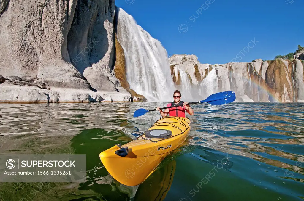 paddling a kayak below Shoshone Falls on the Snake River in the Snake River Canyon near the city of Twin Falls in southern Idaho.
