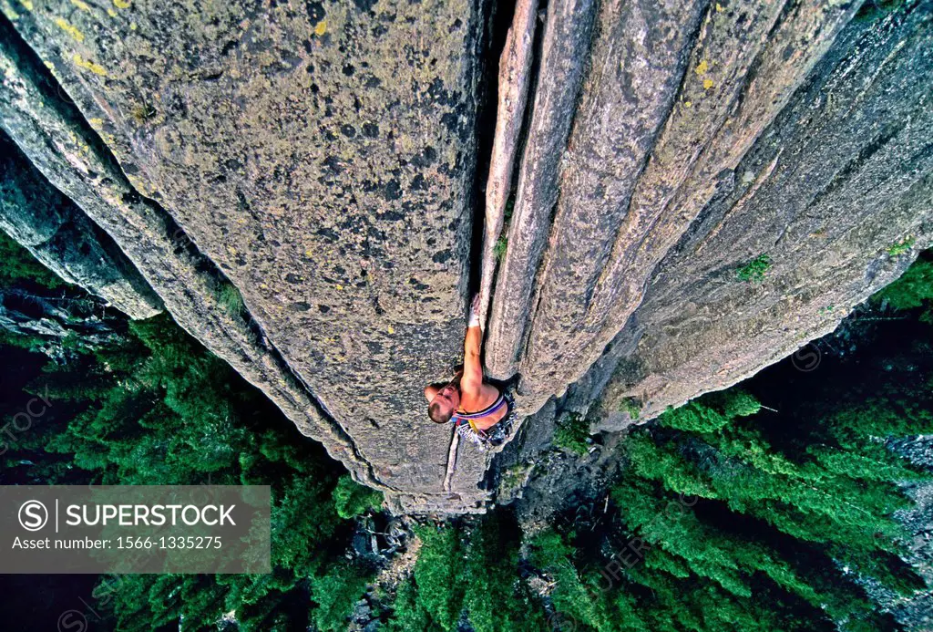 Rock climbing a route called Spare Rib which is rated 5,8 and located on The Spare Rib formation in Gallatin Canyon near the city of Bozeman in Montan...