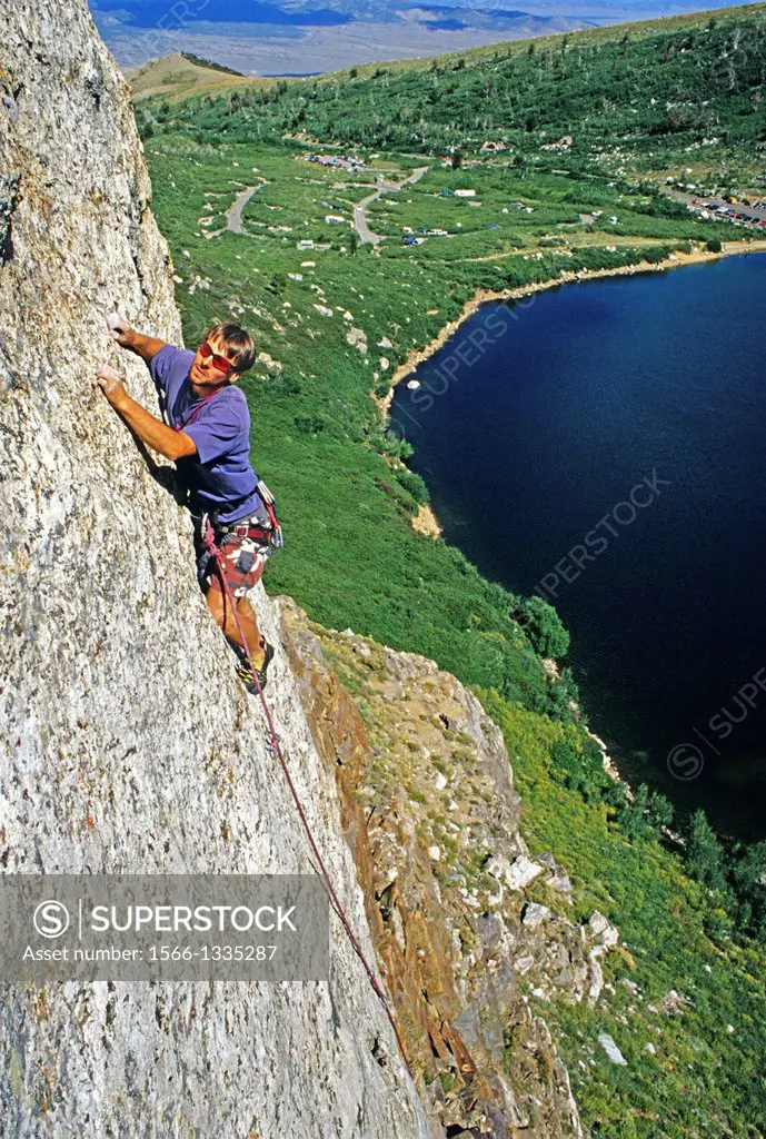 Rock climbing a route called Archangel which is rated 5,10 and located on The Angel Lake Crag at Angel Lake high in the East Humboldt Mountains in nor...