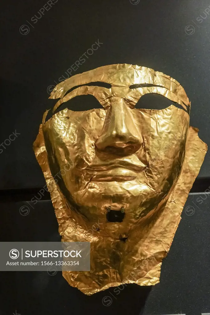 Golden mask. New Empire. Egyptian Pharaonic collection. Louvre Museum. Paris. France.