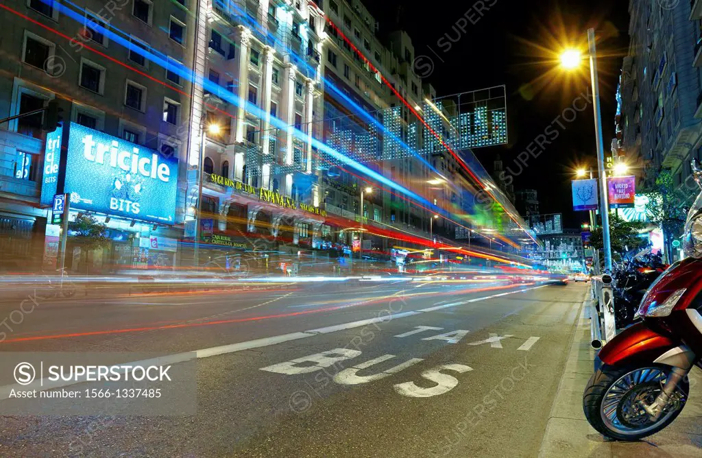 Traffic at Gran via street with lights trails effect at Christmas time. Madrid. Spain.