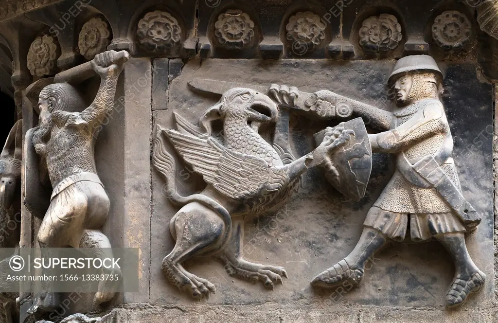 Spain, Catalonia, Barcelona, Cathedral, Relief in Sant Iu Portal. Knight fighting Griffin