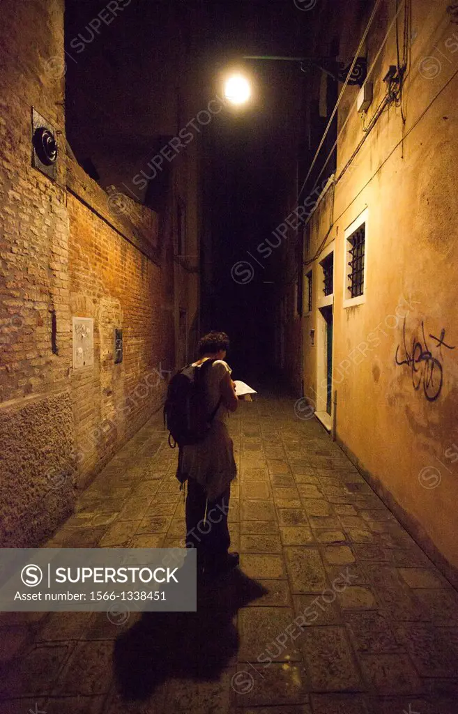 Tourist looking to sleep in Santa Croce district, Venice, Veneto region, Italy, Europe.