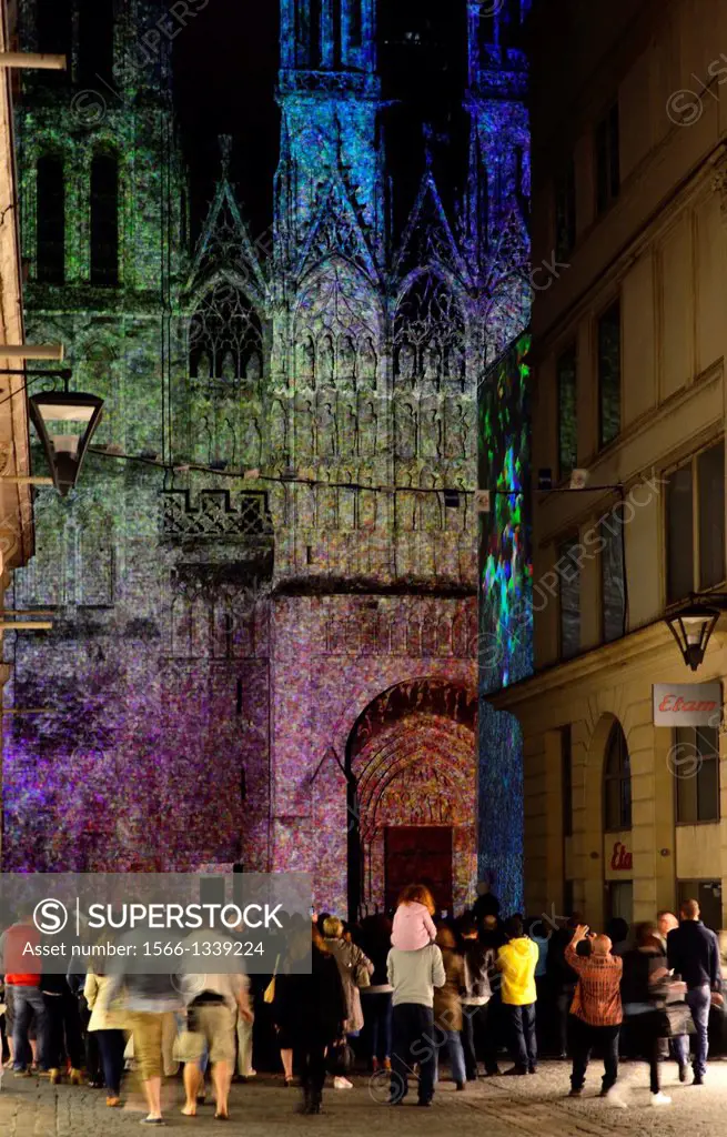light show projected on Notre Dame Cathedral in Rouen, presentation celebrates Impressionism, Rouen is near Giverny which boasts Claude Monet´s beauti...