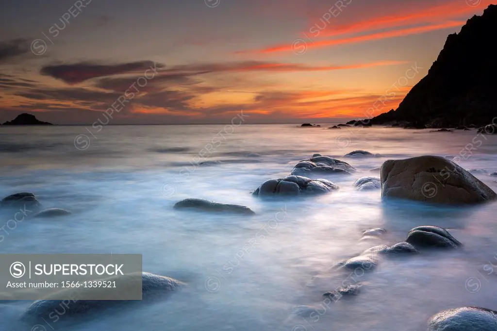 Sunset over the Porth Nanven, a rocky cove near Land's End, Cornwall, England, United Kingdom, Europe.
