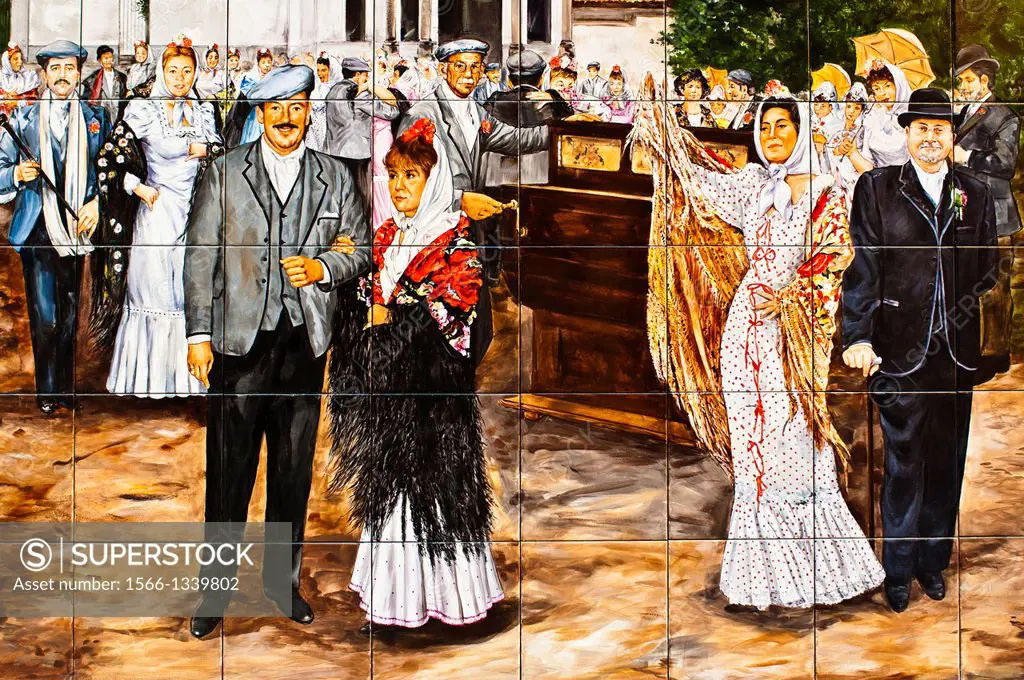 Spain. Madrid. El Madroño (The Strawberry Tree) Tavern. Painted glazed tiles with people dressed with Madrid traditional style of end 19th century.
