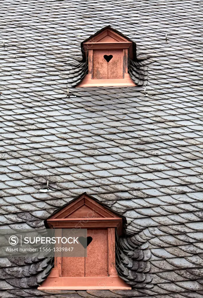 Dormer in a slate roof, shutters with heart, Germany, Europe.