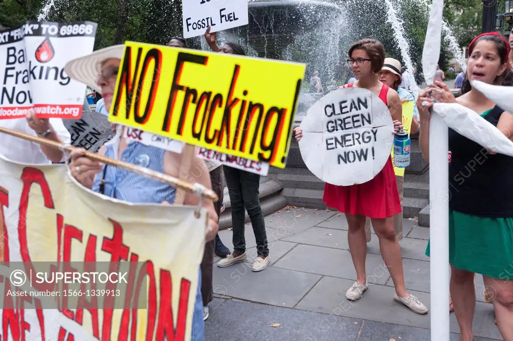 Environmental activists use street theater and a ´´flash mob´´ to get their point across about fracking and natural gas pipelines at a protest in City...