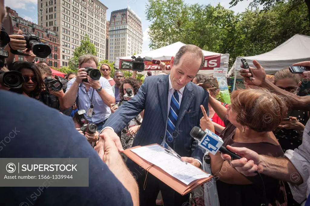 Disgraced former NYS Governor Eliot Spitzer collects petition signatures in Union Square Park in New York on the first day of his recently announced c...