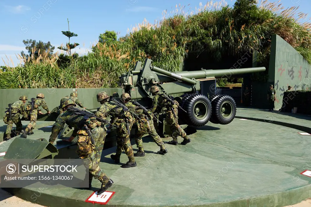 The Taiwan Military soldiers performing positional and firing drills on a US made, 1930's designed M1 155mm Long Tom howitzer.