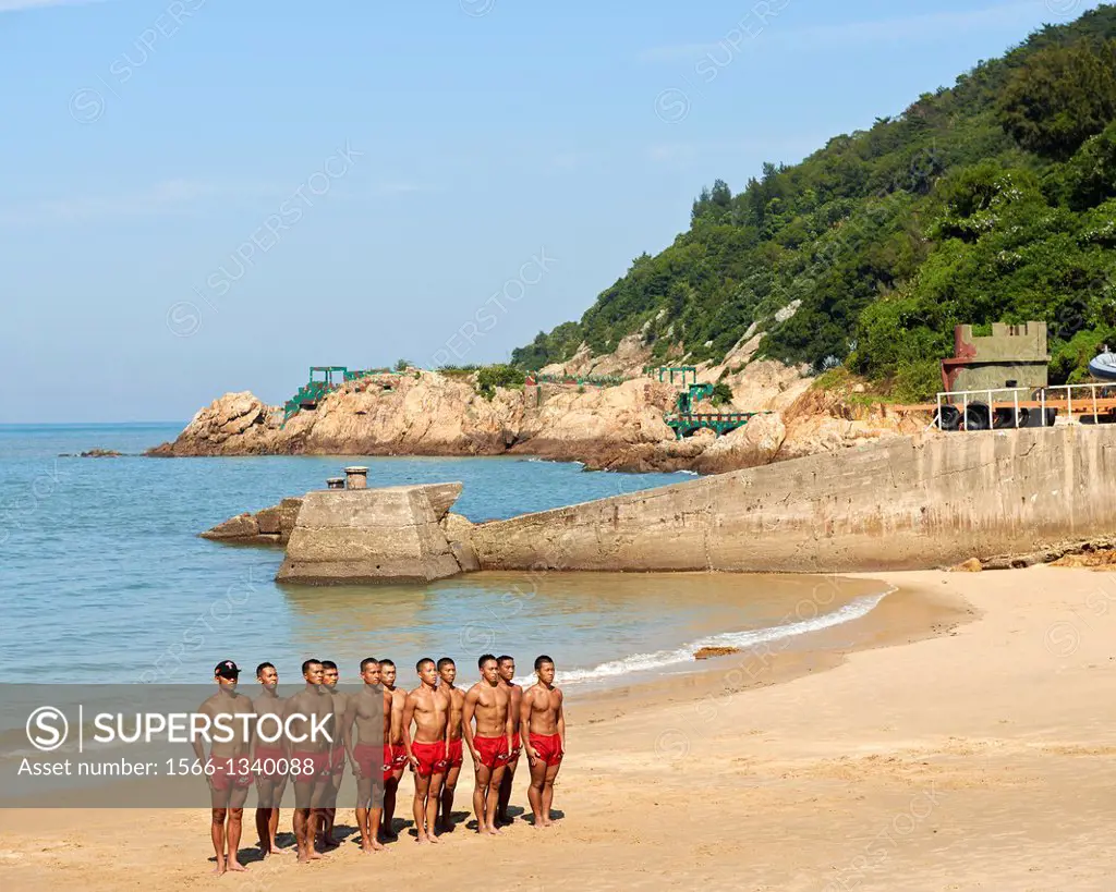 Taiwanese Navy Seals, nicknamed ""frogmen"" train and do exercises to keep in shape on the beach of Nangan on Matsu Island. A troop of 90 seals are ba...