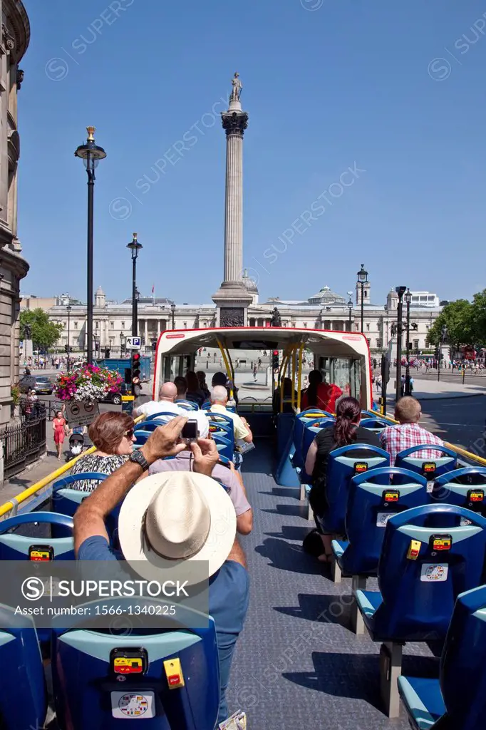Open Top London Tour Bus Approaching Trafalgar Square, London, England.