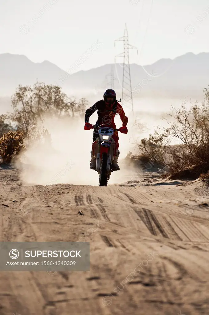 5x Honda motorcyle of Francisco Arredondo passes race mile 58 in 2012 San Felipe Baja 250, San Felipe, Baja California, Mexico.