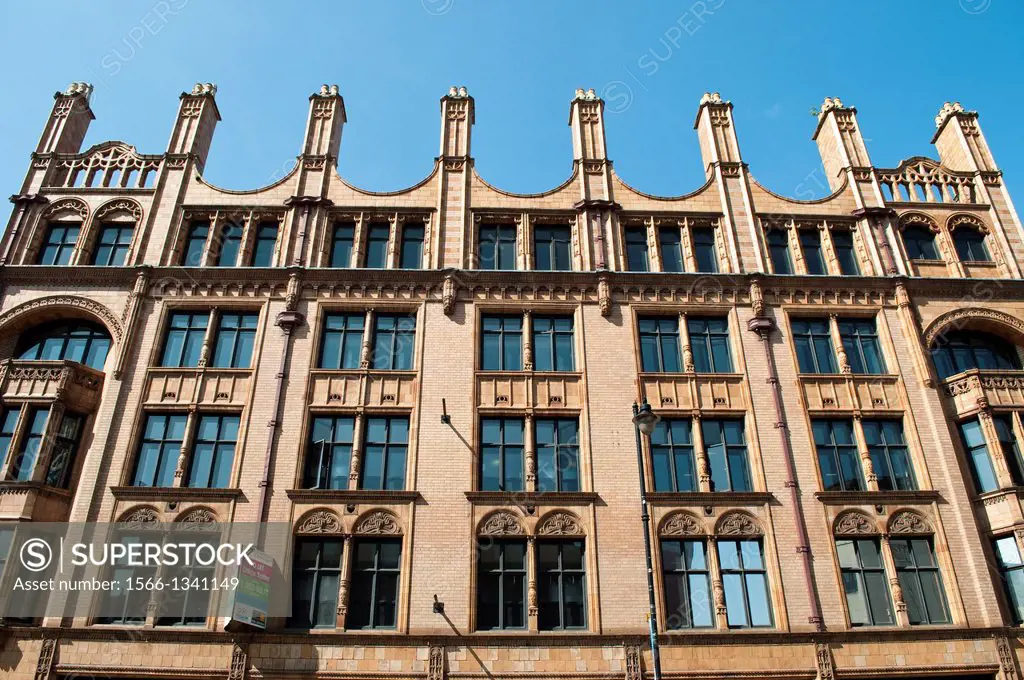Historic brick building on Lower Mosley Street, Manchester, UK.