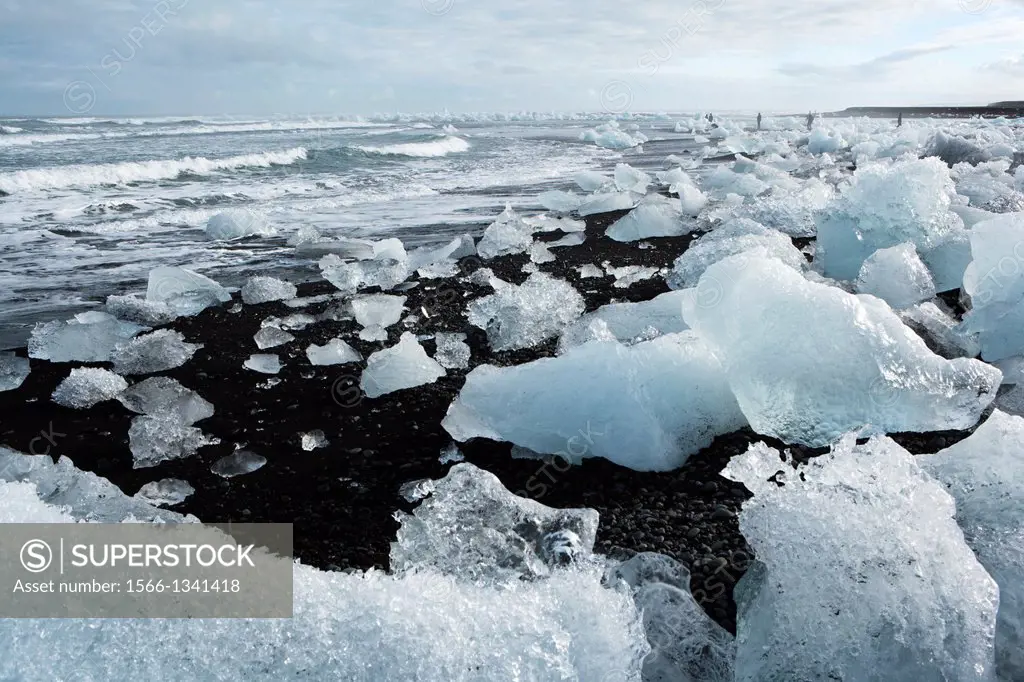 Icebergs on black sand beach at Jokulsarlon - Southeast Iceland.