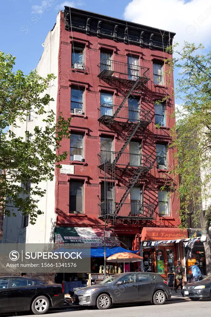Apartment building with fire escapes in New York City.