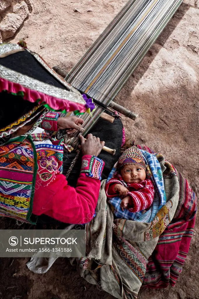 Peruvian Woman Weaving in the sacred valley, peru.