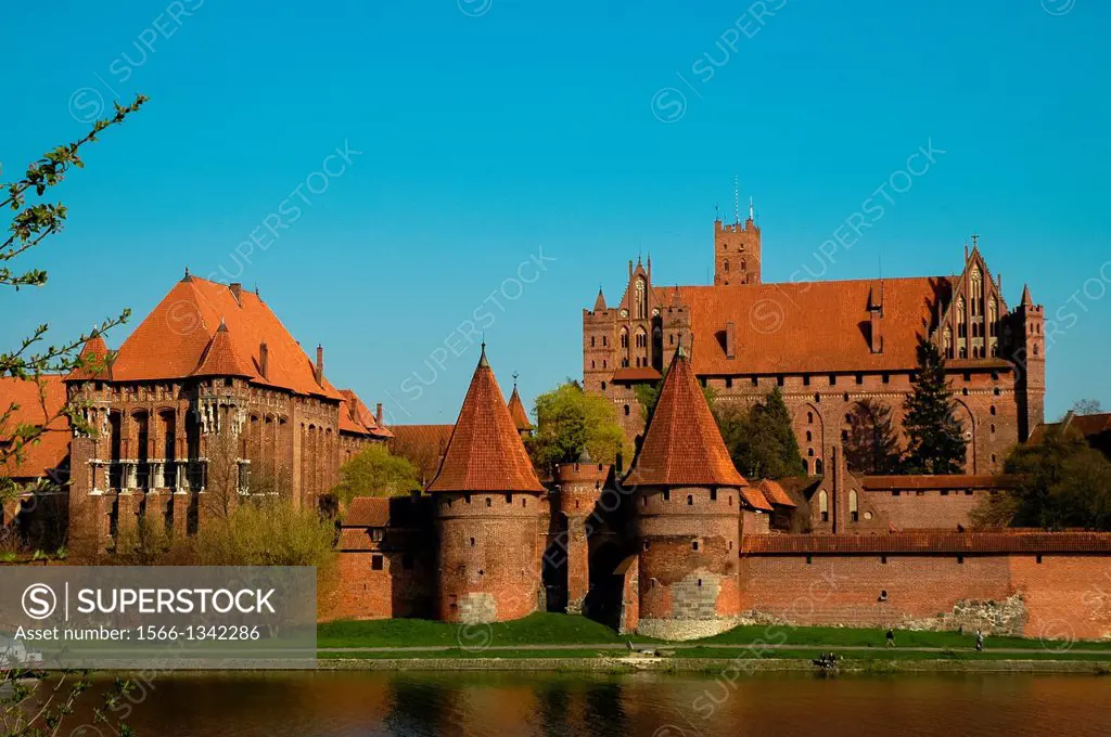 the fortress at Malbork in Poland seen from the riverside