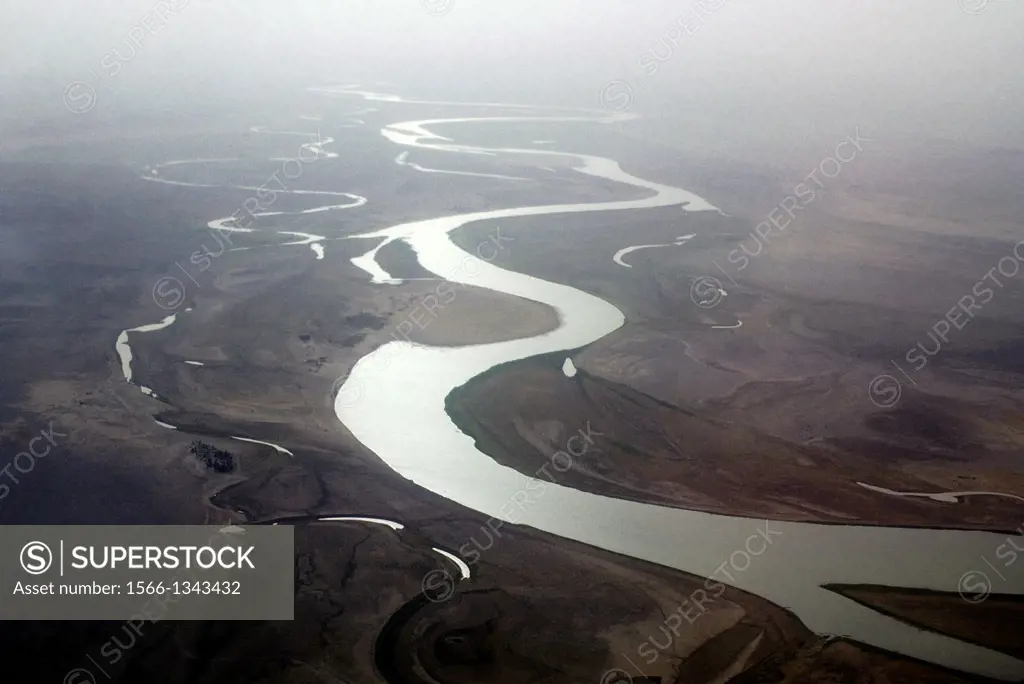 MALI, NEAR TIMBUKTU, AERIAL PHOTO OF NIGER RIVER WITH HARMATTAN DUST STORM.