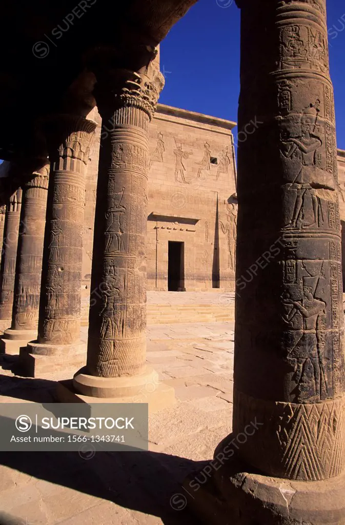 EGYPT, ASWAN, NILE RIVER, AGILKIA ISLAND, PHILAE, WEST COLONNADE VIEW OF FIRST PYLON.