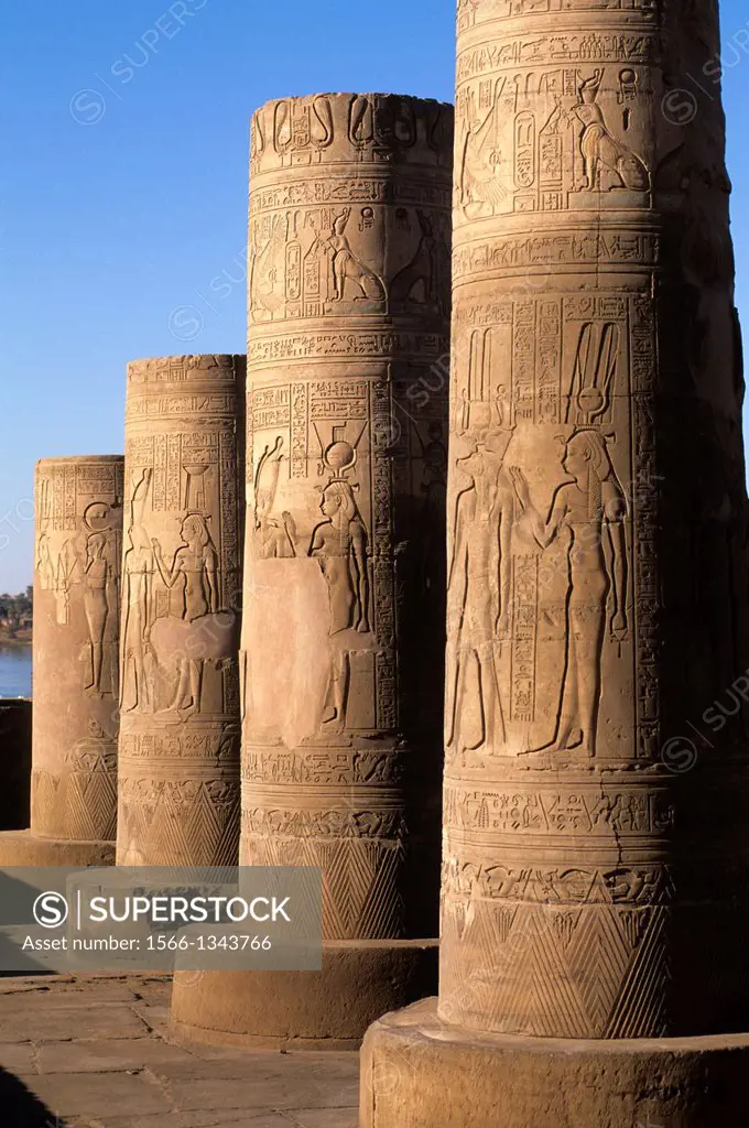 EGYPT, NILE RIVER, KOM OMBO TEMPLE, COLUMNS WITH RELIEF CARVINGS.