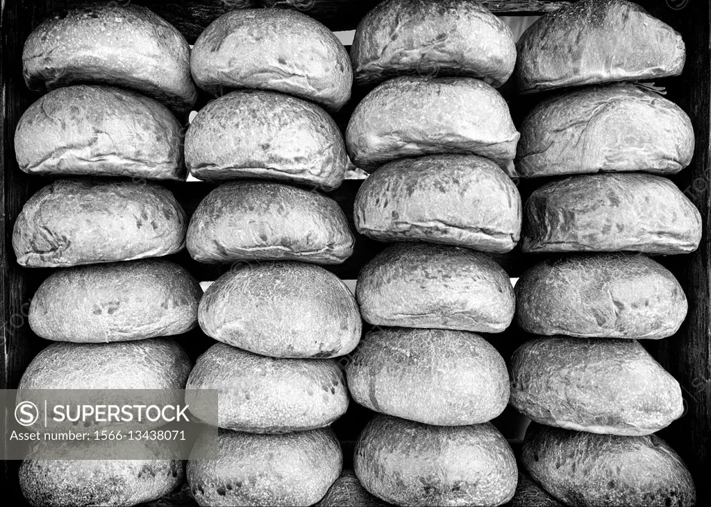 Close up of bread rolls neatly stacked