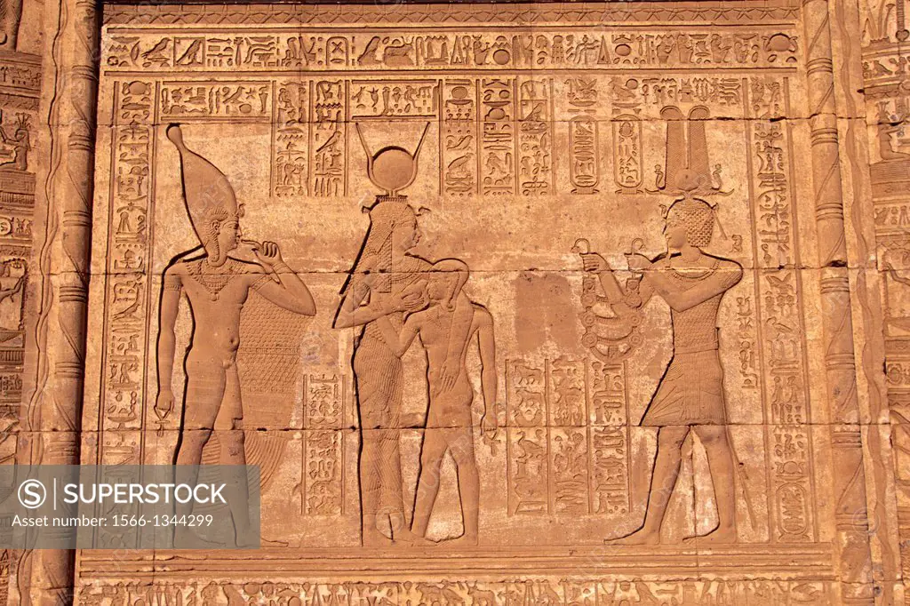 EGYPT, DENDERA, TEMPLE OF DENDERA, ROMAN MAMMISI, BIRTH HOUSE, CARVING, HATHOR NURSING HORUS.