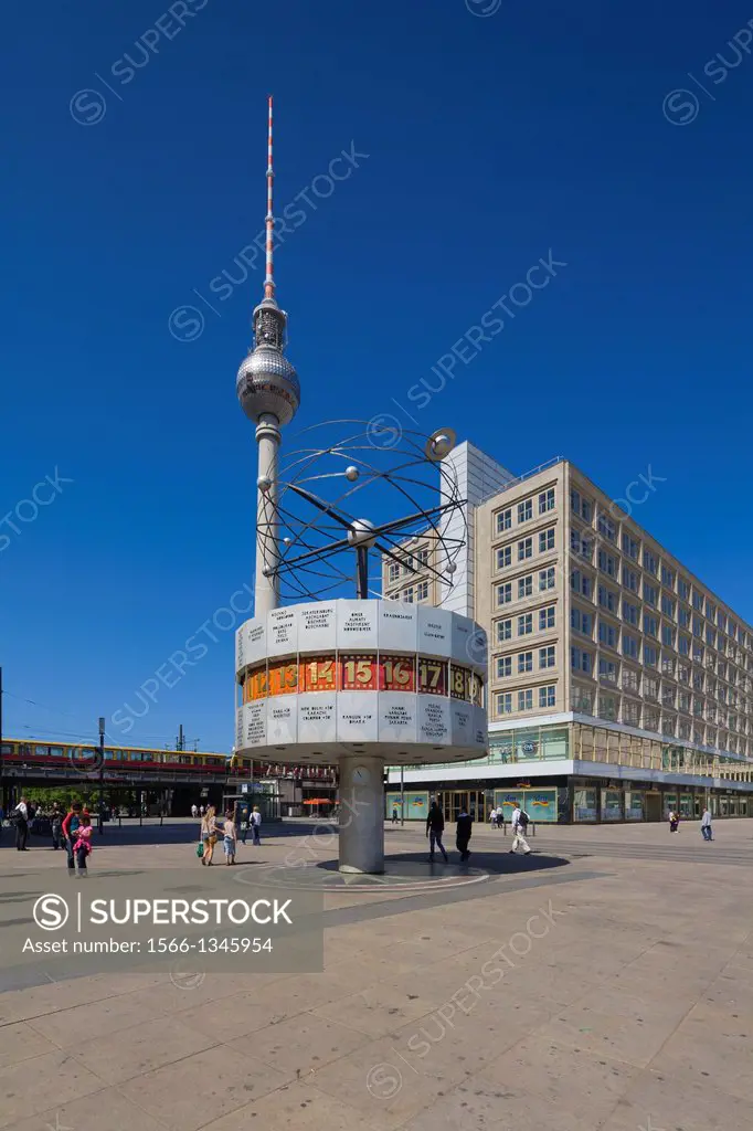 the square Alexanderplatz with TV Tower and World Time Clock, and Berolinahaus building Peter Behrens, Mitte district, Berlin, Germany, Europe.
