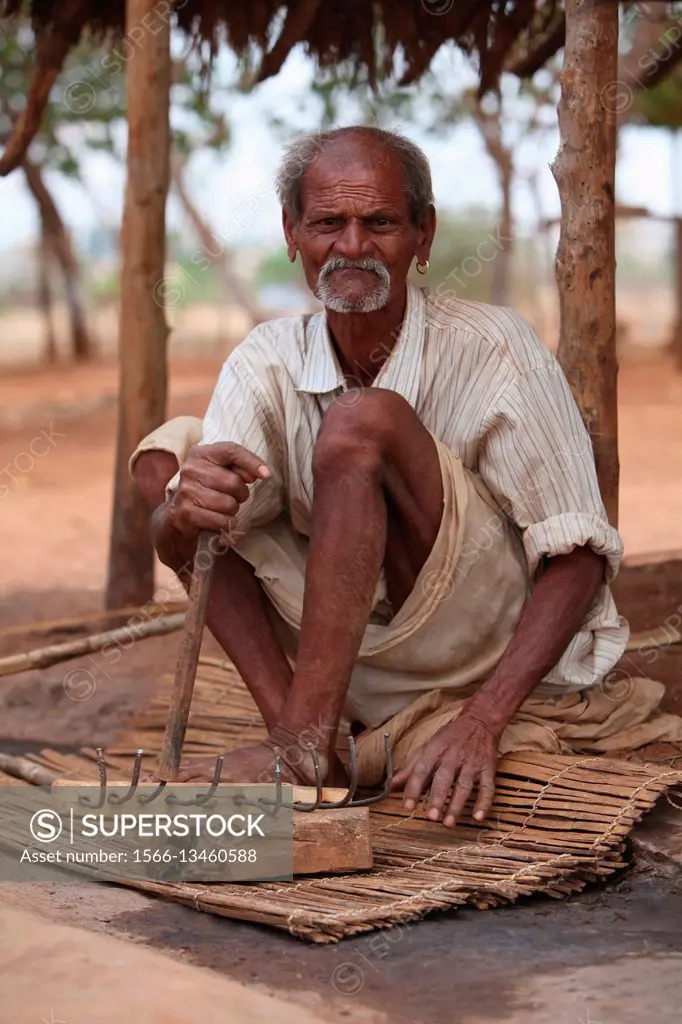 Tribal man, Ma Thakar Tribe, Kharbachi wadi, Karjat, Maharashtra, India.