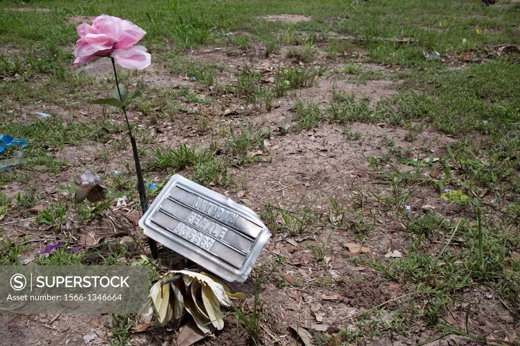 Falfurrias, Texas - Graves in Sacred Heart Cemetery where the remains of unidentified migrants are buried. Dozens of migrants without legal papers die...