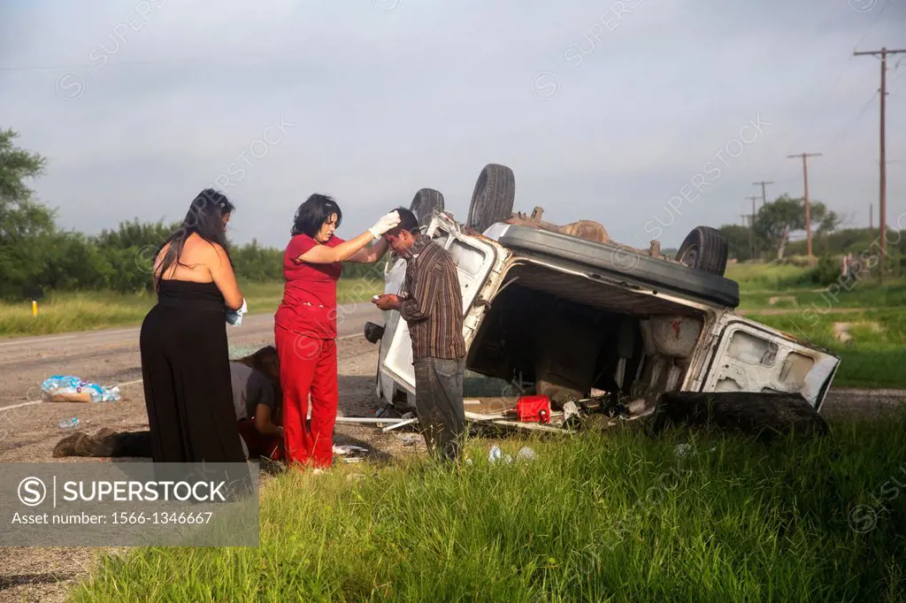 Falfurrias, Texas - An van holding 26 undocumented immigrants from Central America overturned on Texas Highway 285. The driver had picked up the migra...