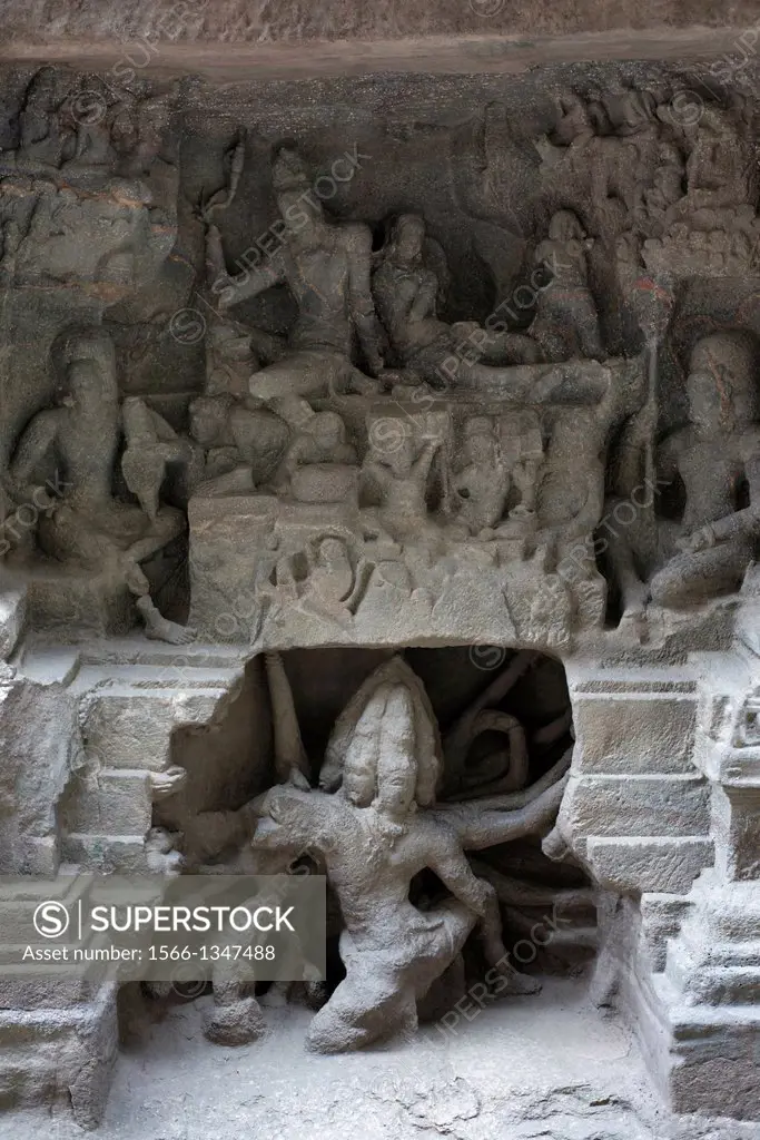 Cave No 16 : Ravana shaking Kailasa on the southern side of rock-cut cave temple No. 16, Ellora. Maharashtra.