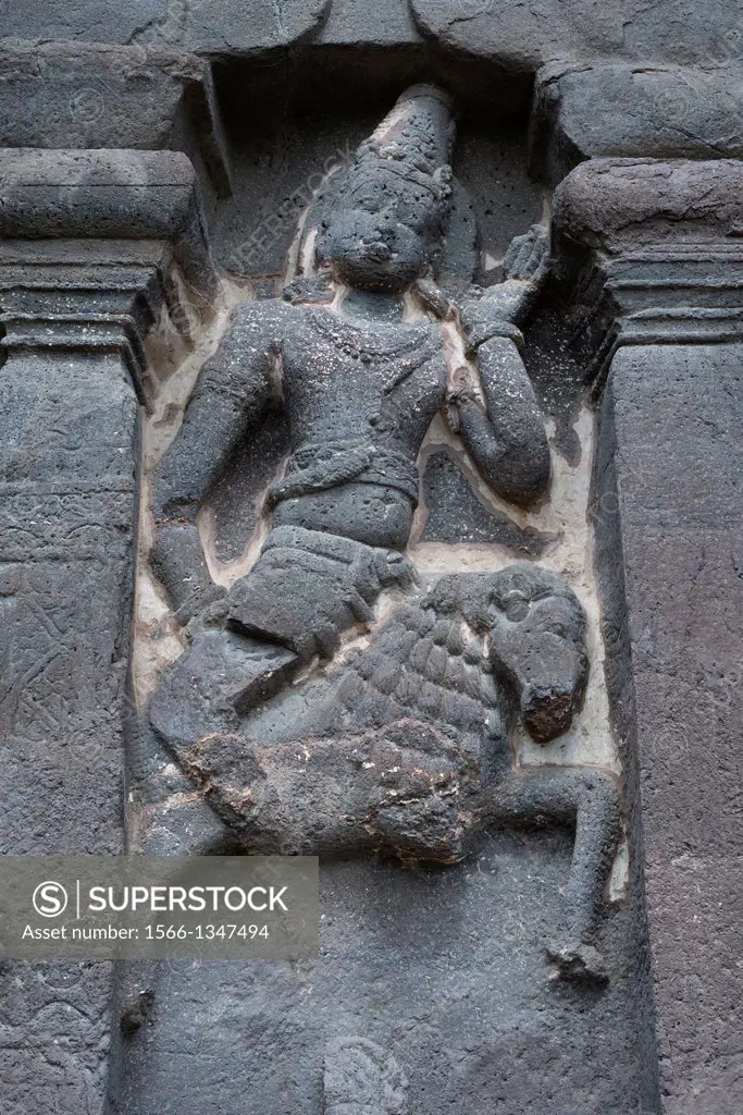 Cave No 16 : One of the Dikapalas or guardians of direction on the left of the entrance of rock-cut temple, Kailasa, Ellora. Maharashtra. 757-772 A.D.