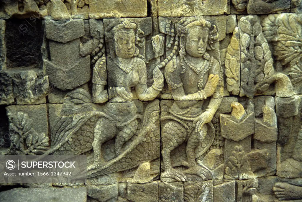 INDONESIA, JAVA, MALENG, CENTRAL JAVA, BOROBUDUR BUDDHIST TEMPLE, BASS RELIEF CARVINGS.