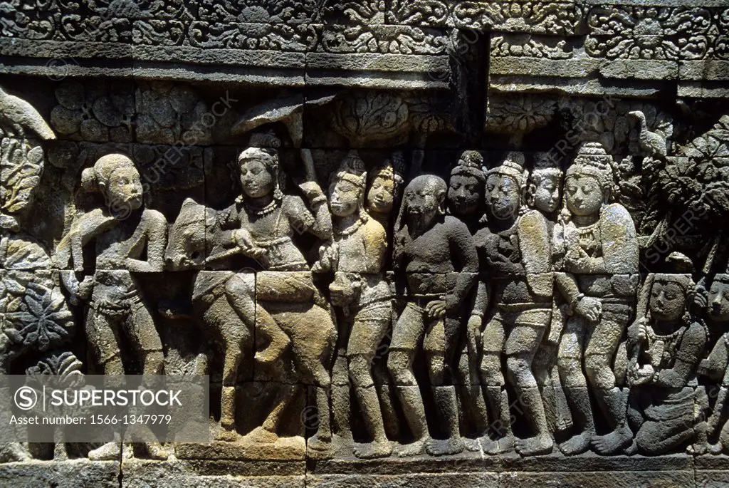 INDONESIA, JAVA, MAGELANG, CENTRAL JAVA, ANCIENT BOROBUDUR BUDDHIST TEMPLE, BASS RELIEFS FOUND THROUGHOUT TEMPLE.