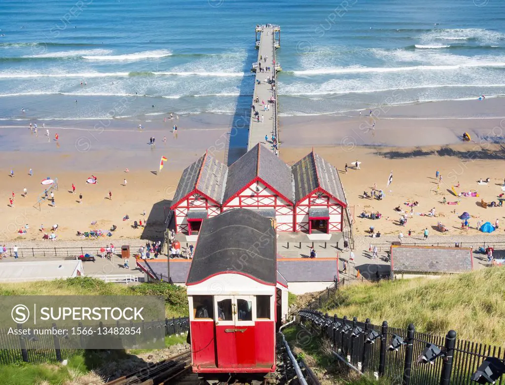 View over Saltburn`s cliff lift and Victorian pier from top promenade. Saltburn by the sea, North Yorkshire, England, United Kingdom.