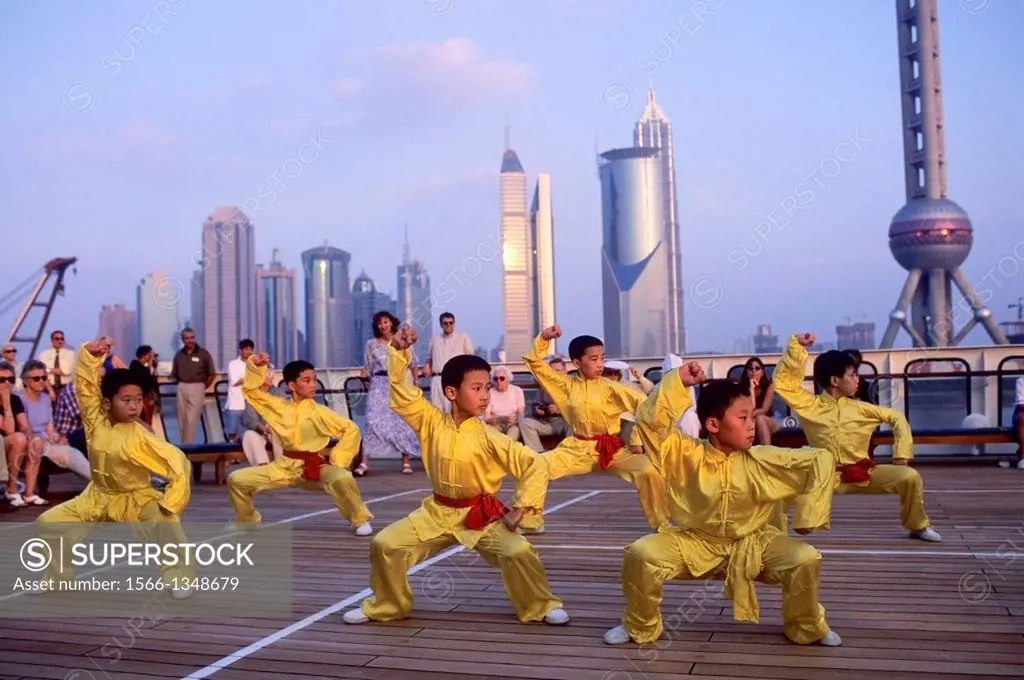 CHINA, SHANGHAI, MS CLIPPER ODYSSEY, YOUNG BOYS PREFORMING MARTIAL ARTS.