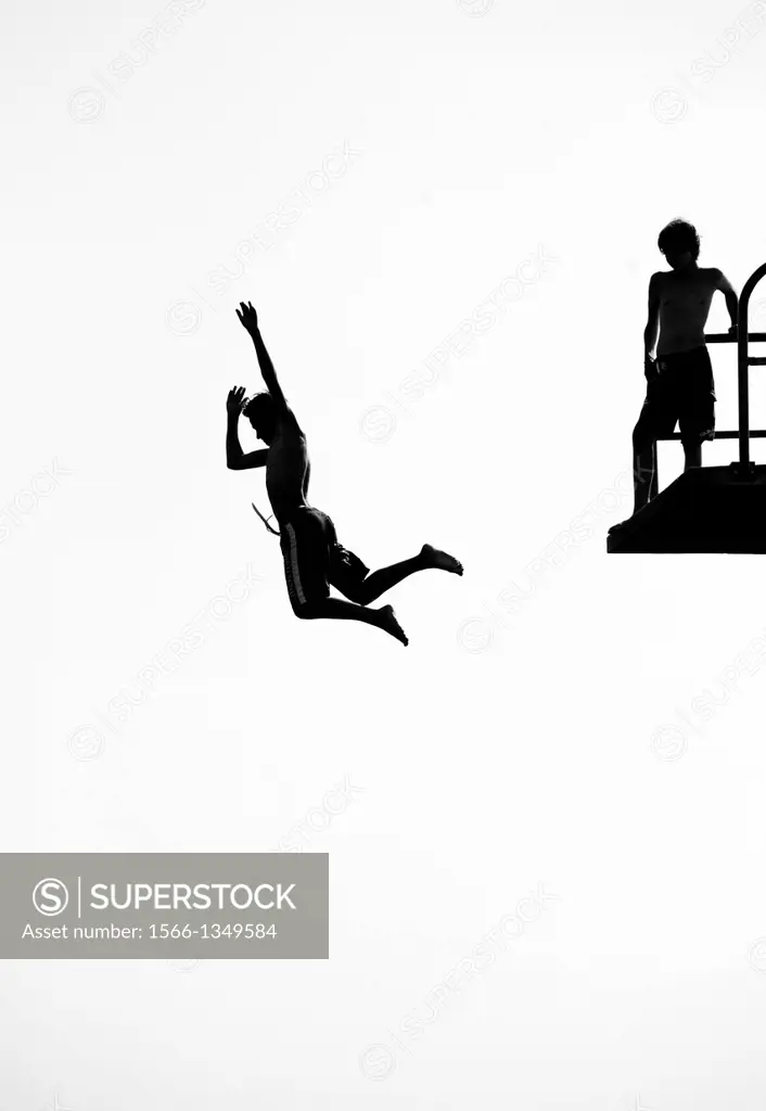 man jumping from the diving platform
