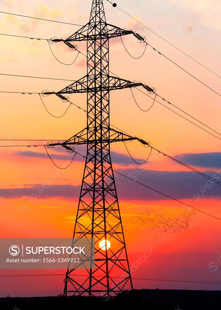 High Voltage electricity transmission tower, electricity pylon, at sunset taken near Sanahuja on the la Segarra area, Lleida province, Catalonia, Spai...