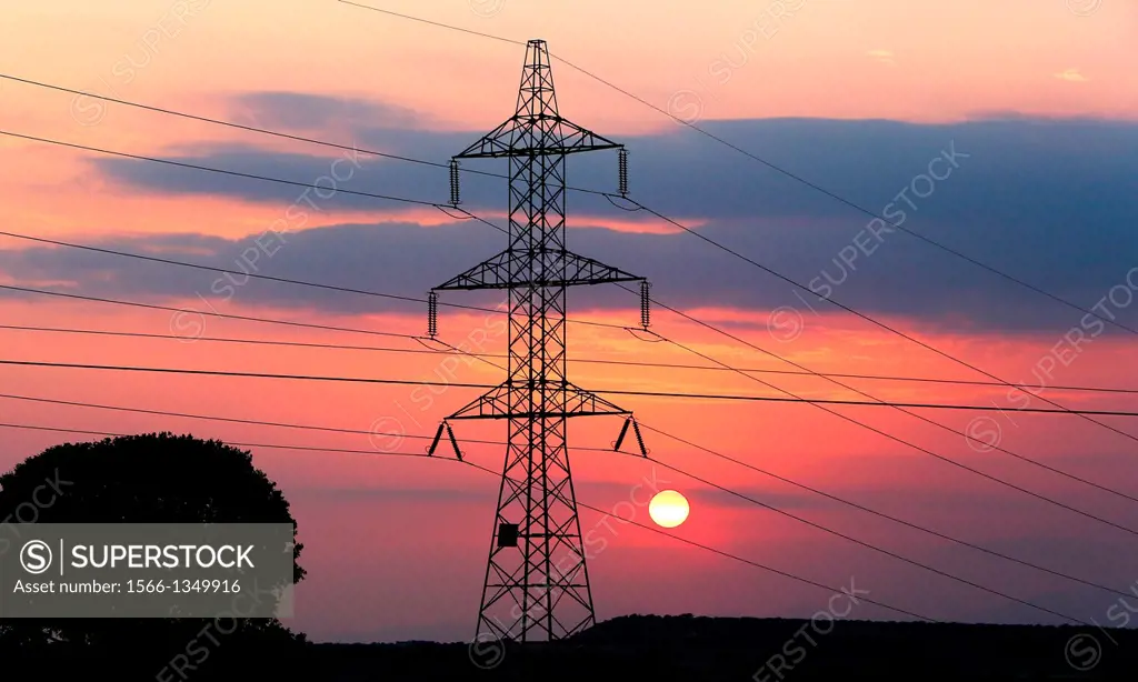 High Voltage electricity transmission tower, electricity pylon, at sunset taken near Sanahuja on the la Segarra area, Lleida province, Catalonia, Spai...