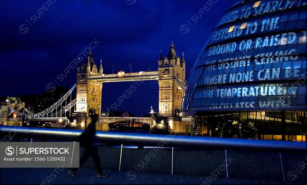 Tower Bridge and City Hall over the Thames River at Night, London. United Kingdom.