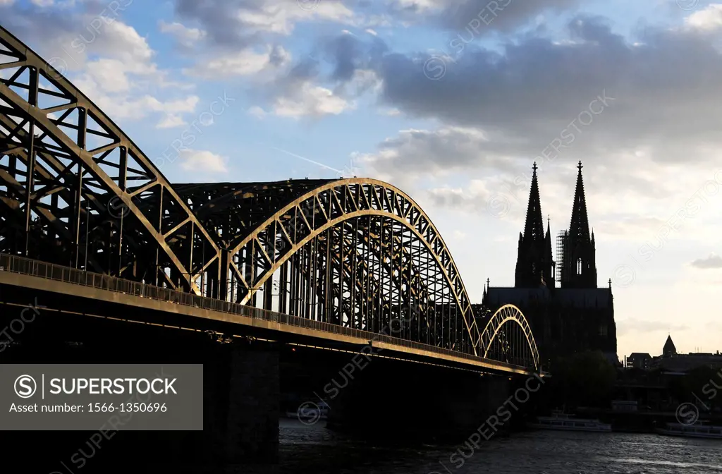 Cologne Cathedral and Hohenzollern Bridge at dusk