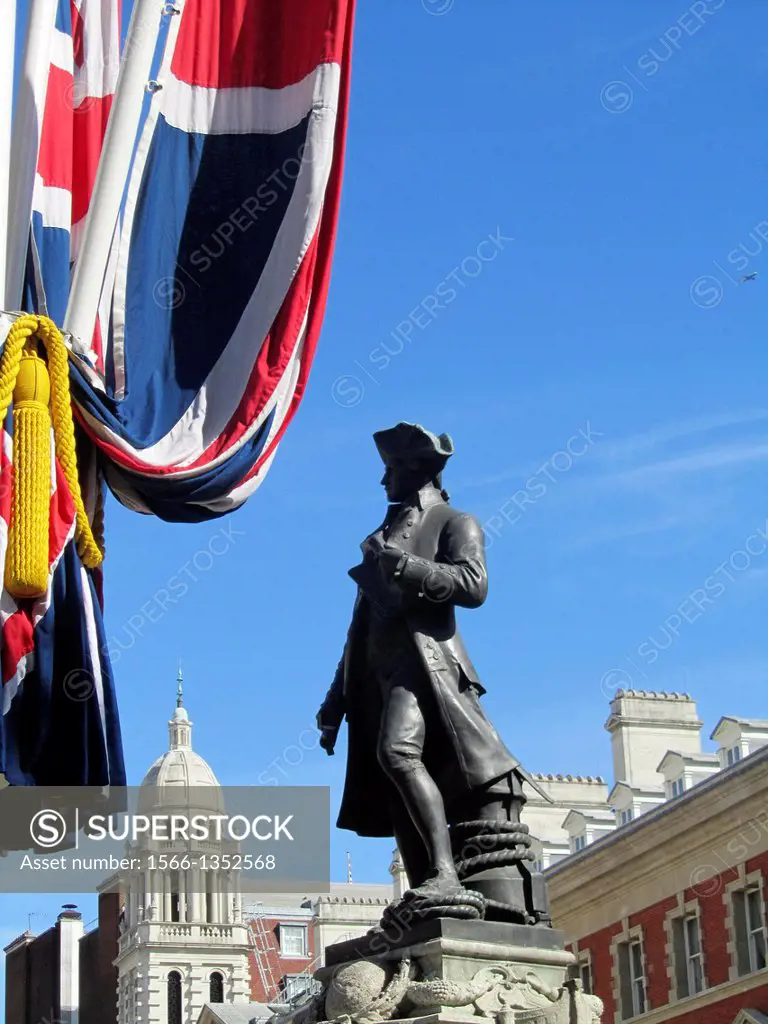Captain James Cook statue with the Old Admiralty Building on the right and opposite, the Admiralty Arch. London, England, Great Britain, Europe.