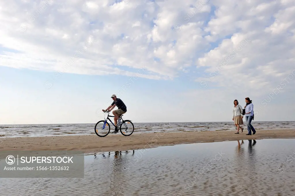 two young women walking on the beach, Jurmala, Gulf of Riga, Latvia, Baltic region, Northern Europe.