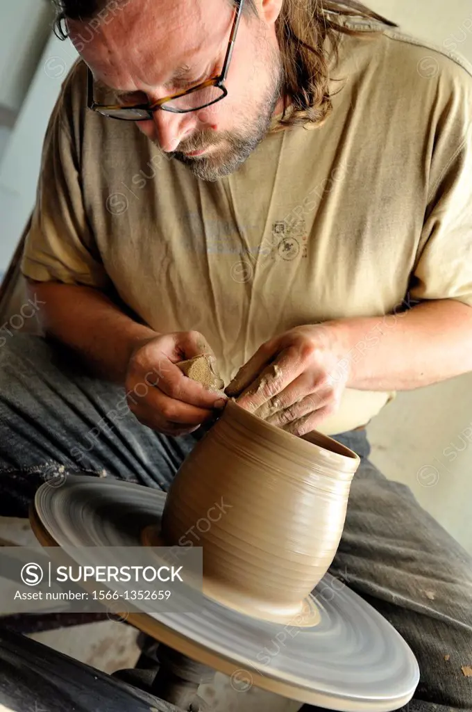 Ivars, potter craftman in his workshop at Kemeri, Jurmala, Gulf of Riga, Latvia, Baltic region, Northern Europe.